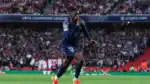 Dembele celebrates PSG's winning goal against Arsenal in the Champions League semi-final.