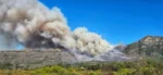 Table Mountain fire spreads towards Noordhoek, prompting evacuations. Stay safe.
