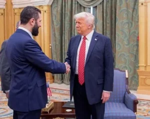 Trump Shakes Hands with EX-Al-Qaeda Leader, al-Sharaa, in Riyadh. US policy shift, regional impact