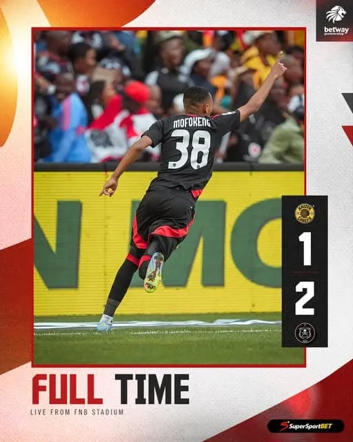 Orlando Pirates players jubilantly celebrating their Soweto Derby victory against Kaizer Chiefs, securing a memorable league double.