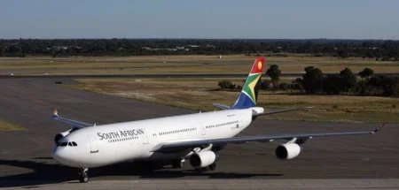 South African Airways logo overlaid with a digital glitch effect, symbolizing the recent cyberattack and system disruption.