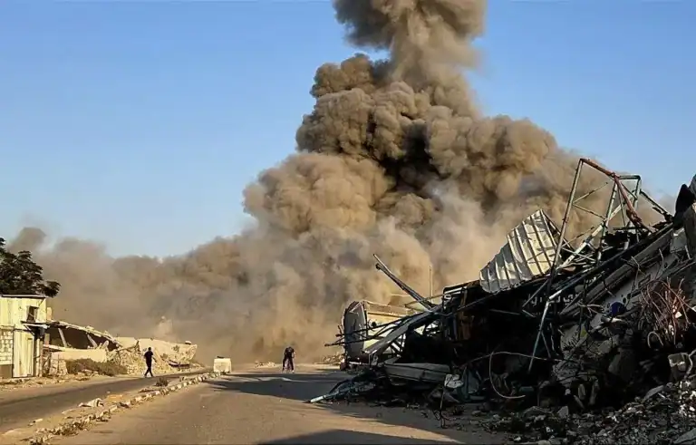 Desperate civilians receiving humanitarian aid during the Gaza ceasefire push amid Israeli operations.