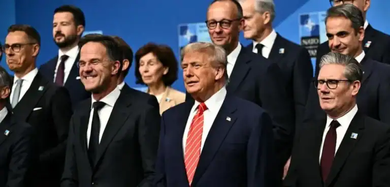 NATO leaders discussing defense spending and collective security at a summit, with Ukraine on their minds.