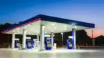 Modern South African petrol station with EV charging and solar panels symbolizing future forecourts.