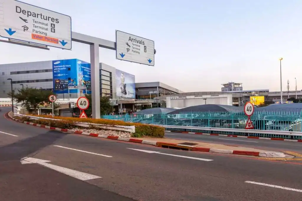 Passengers experiencing significant travel delays at OR Tambo International Airport due to operational issues.