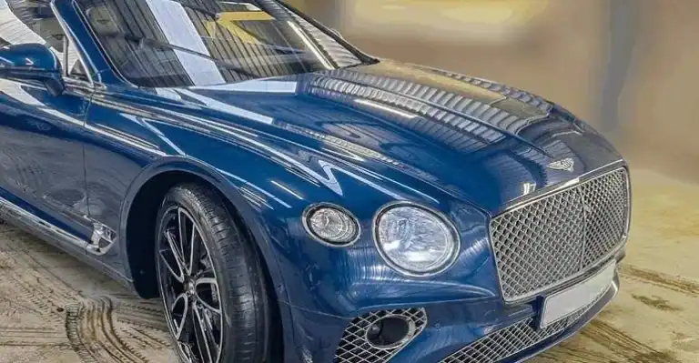 Bentley and Royal AM tour bus sold at auction during Shauwn Mkhize asset seizure in Durban.