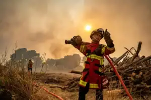 Wildfires sweep Southern Europe as heatwave triggers mass evacuations and extreme weather crisis.