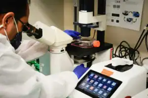 Scientists at Amsterdam UMC conducting HIV vaccine research with Gates Foundation support.