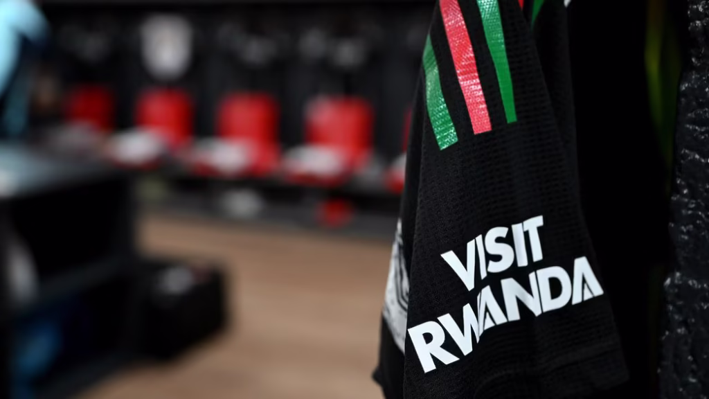 Arsenal jersey featuring the Visit Rwanda sleeve logo marking the 2026 partnership conclusion.