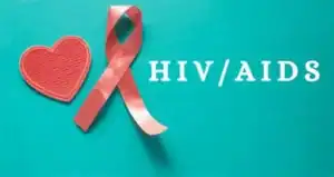Caregiver supporting an HIV/AIDS orphan in a community setting, highlighting emotional and social resilience.