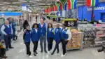 Inside the first Walmart store in South Africa at Clearwater Mall showing wide aisles and signage.