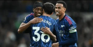 Arsenal players celebrate a 4-0 victory over Leeds United in the 2025-26 Premier League season