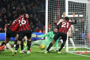 Bournemouth players react after scoring late winner to defeat Liverpool 3-2 in dramatic Premier League match
