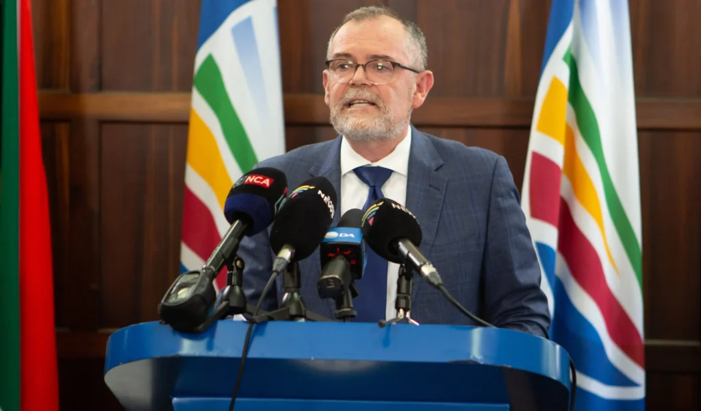 Former Minister Dion George speaking at a press conference regarding his resignation from the DA.