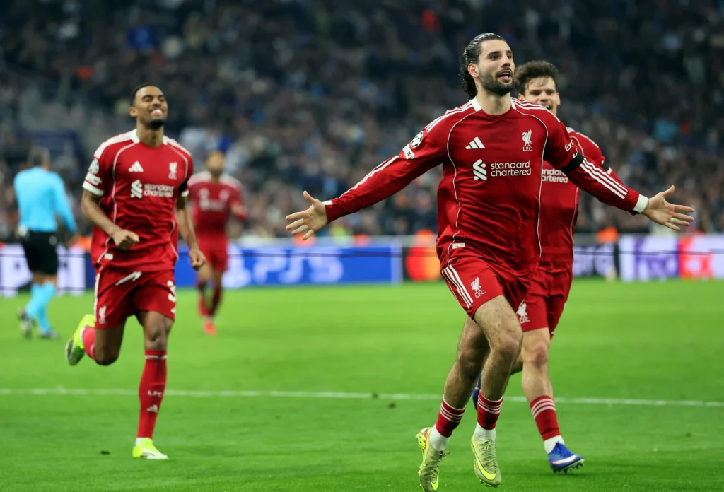 Liverpool players celebrate 3-0 win over Marseille, moving closer to UEFA Champions League last 16
