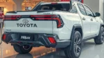New Toyota Hilux 2026 double-cab showing the bold Cyber Sumo grille and redesigned LED headlights.