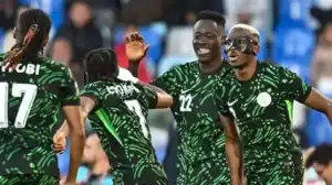 Victor Osimhen celebrates after Nigeria defeats Algeria in AFCON 2025 to securing semifinals bound.