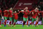 Morocco goalkeeper Yassine Bounou saves a penalty during the 2025 AFCON semifinal against Nigeria.