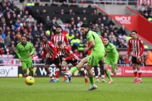 Fulham celebrate a 3-1 Premier League win over Sunderland at the Stadium of Light led by Raul Jimenez