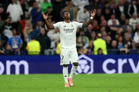 Vinicius Junior scores the winning goal as Real Madrid beat Benfica 2-1 in the UEFA Champions League