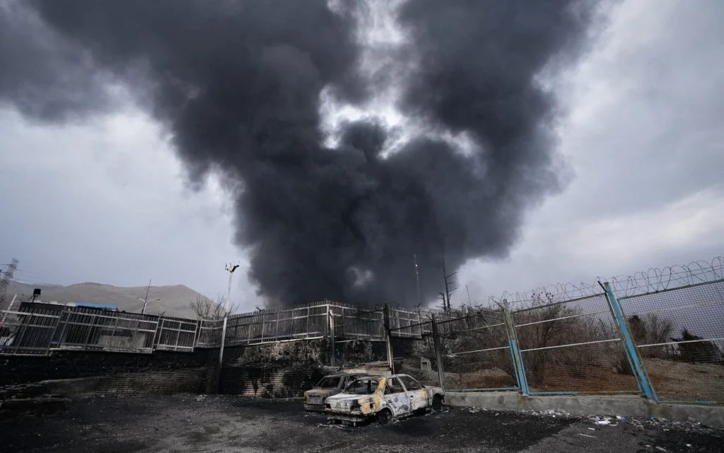 Israeli military jets launching wide-scale strikes over Tehran and Esfahan in Iran at night.