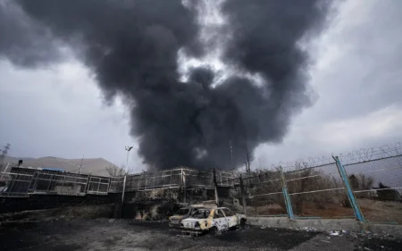 Israeli military jets launching wide-scale strikes over Tehran and Esfahan in Iran at night.