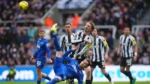 Everton players celebrate a 3-2 Premier League victory over Newcastle at St James' Park.