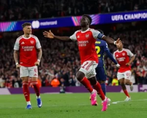 Bukayo Saka celebrates scoring the winning goal as Arsenal beats Atletico to reach the UCL final.