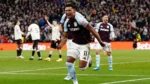Ollie Watkins celebrates as Aston Villa beats Liverpool 4-2 to qualify for the Champions League.