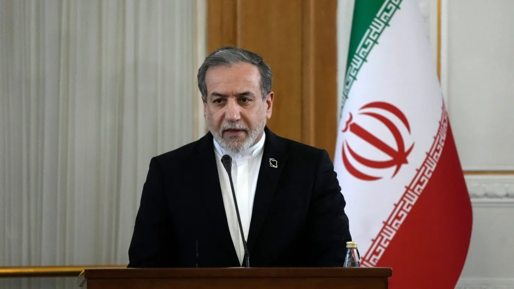 Iranian and US flags representing the 30-day war end proposal and ceasefire negotiations.