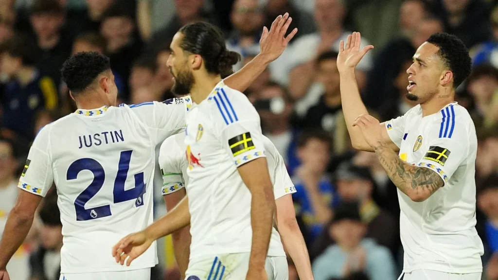 Leeds United players celebrate 3-1 victory over Burnley in the Premier League.