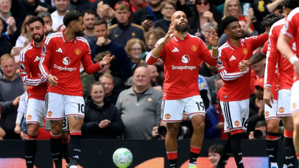 Bruno Fernandes celebrates with teammates as Man United wrap up third in eventful win over Forest.