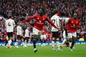 Man Utd defeat Liverpool to Secure UEFA Champions League Spot celebration at Anfield.