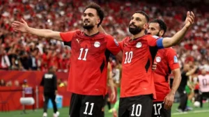Mohamed Salah celebrates as Egypt secure their first World Cup victory with a 3-1 win over New Zealand