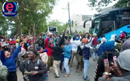 Malawian nationals celebrate as repatriation buses arrive at Sherwood Hall in Durban for return