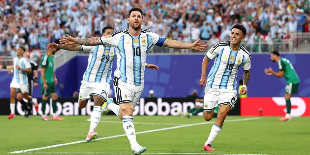 Lionel Messi celebrates his hat-trick during Argentina's 3-0 World Cup victory over Algeria