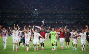 Morocco players celebrate after defeating Netherlands on penalties in FIFA World Cup 2026 last 16.