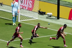 Boualem Khoukhi celebrates Qatar's late equaliser against Switzerland at FIFA World Cup 2026