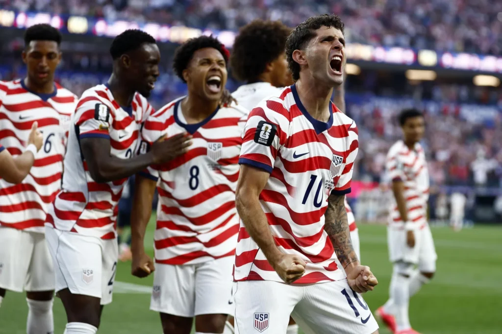 USA players celebrate after defeating Paraguay 4-1 in the FIFA World Cup opener match