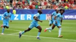 Yoane Wissa celebrates after scoring DR Congo's historic first World Cup goal against Portugal