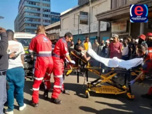 Police secure the scene after a boy was shot in Johannesburg CBD during protest-related unrest incident.